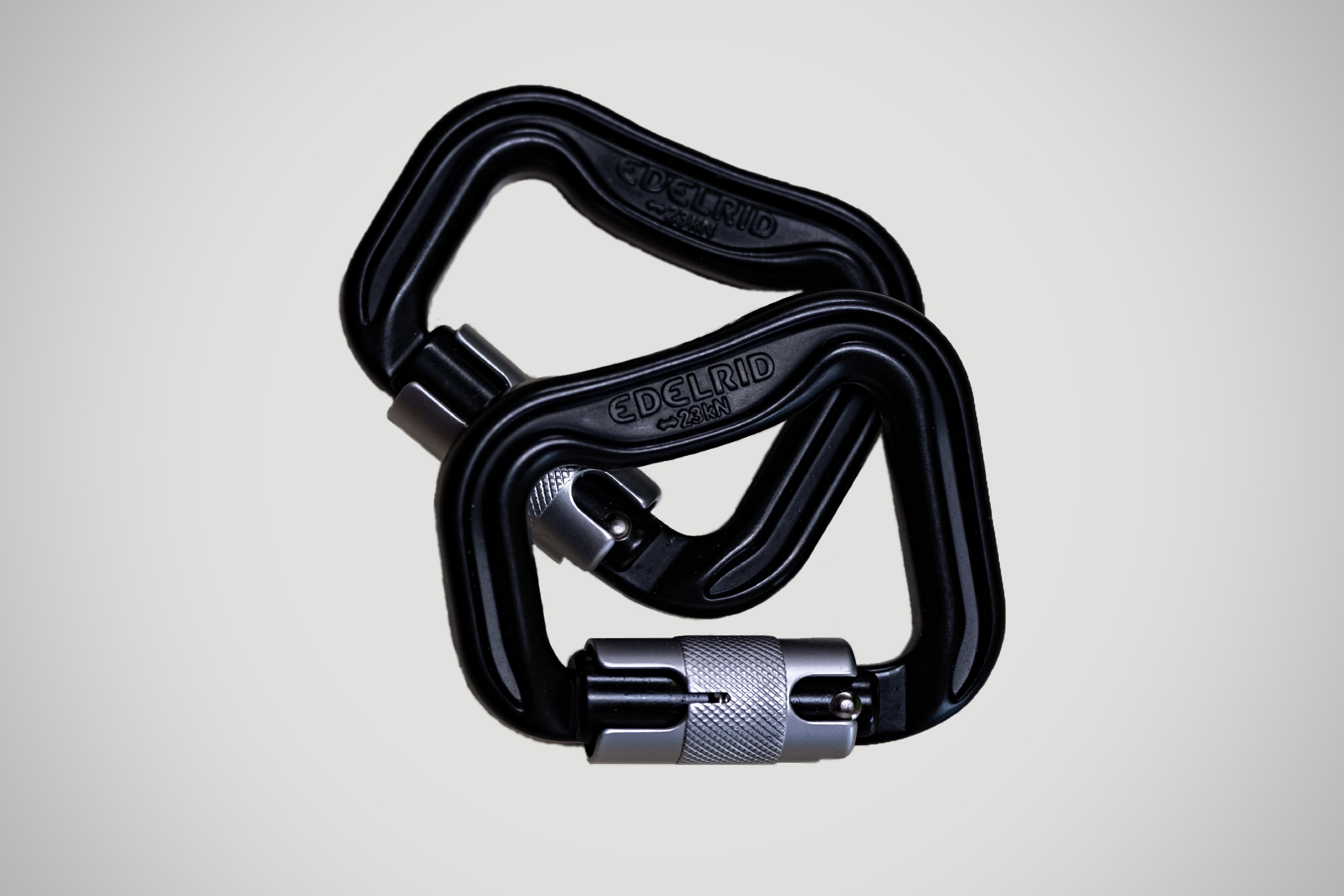 Paragliding carabiners used in connection points.